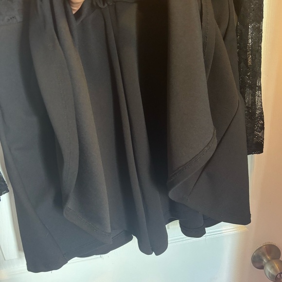 Black long sleeve dress with lace sleeves. - Picture 3 of 6